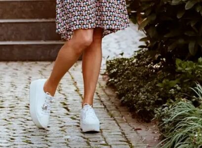 white sneakers for women over 50 combined with a dress