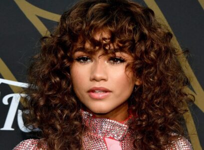 zendaya rezo cut natural curly hair face forming layered hairstyle