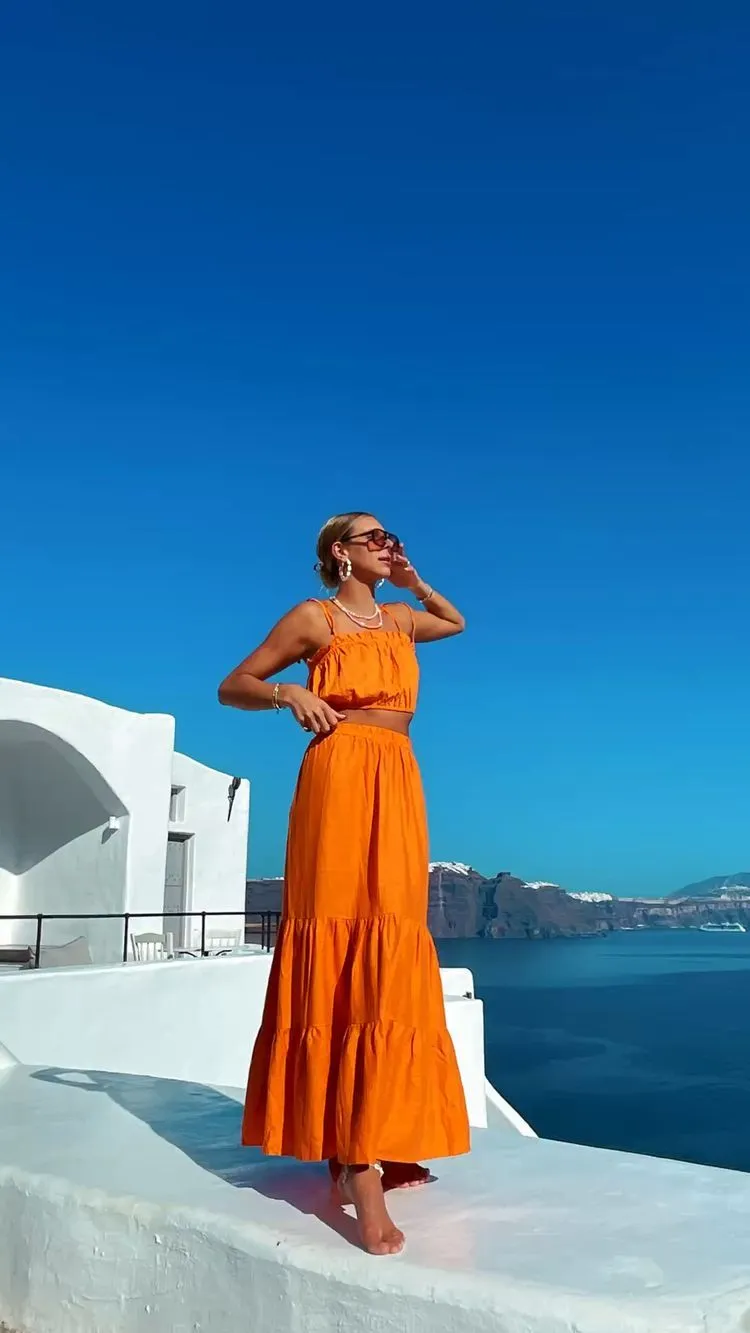 bright orange maxi skirt and matching top