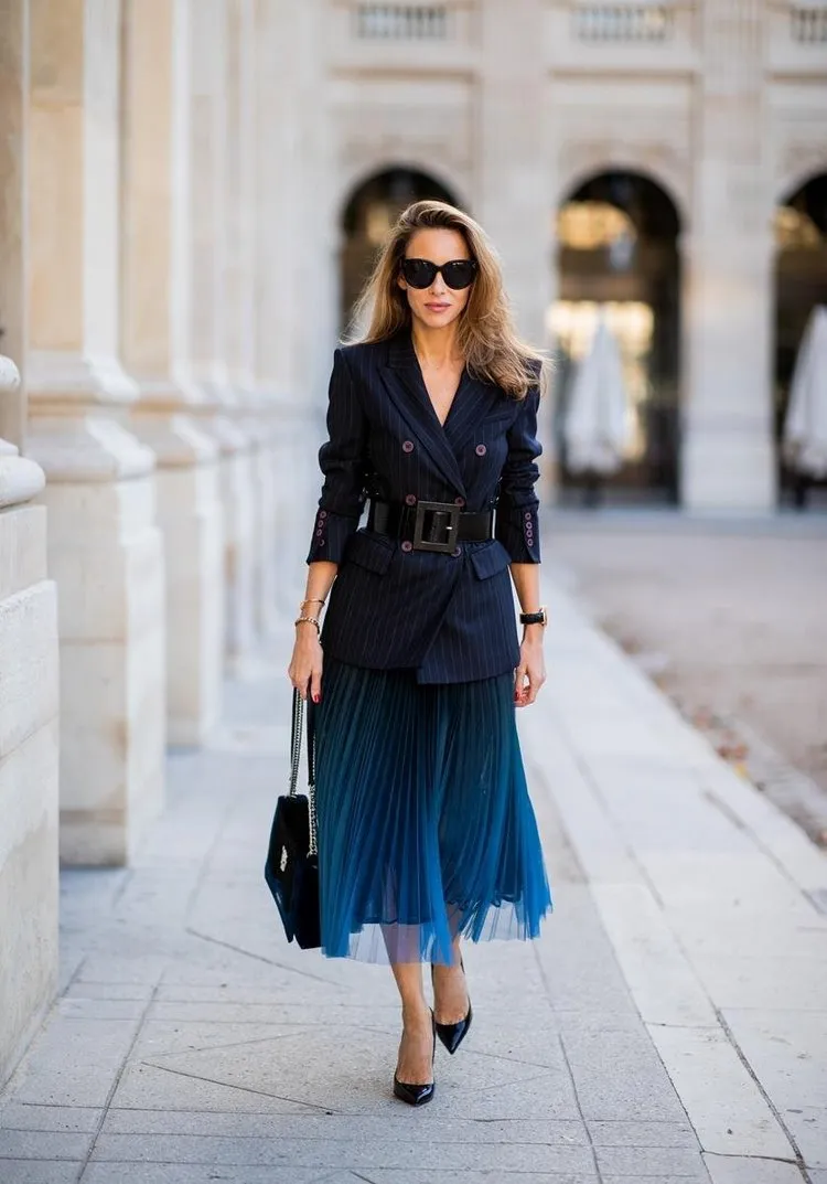 combine your pleated skirt with a blazer and belt for the perfect office outfit