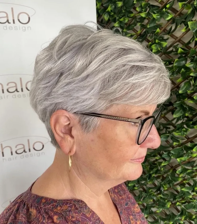 gray pixie with side swept bangs for older women