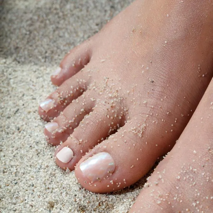 nude and neutral pedicure 2023 summer nail trends