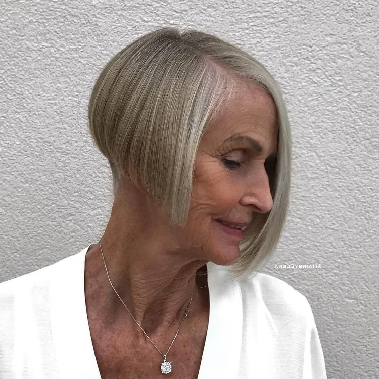 short asymmetrical bob with side parting for women over 50