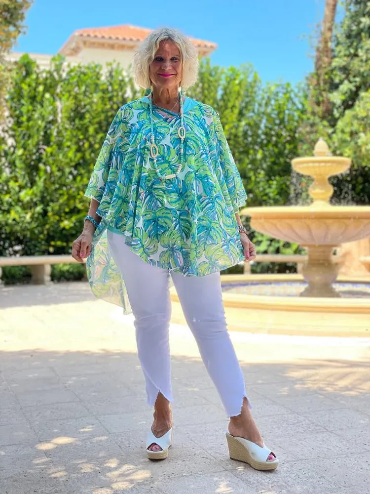 summer fashion trends for ladies over 60 white pants and colored tunic