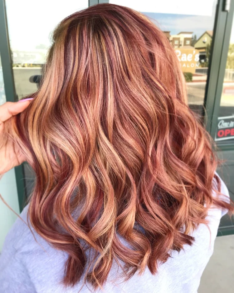 thin cherry red and blonde highlights