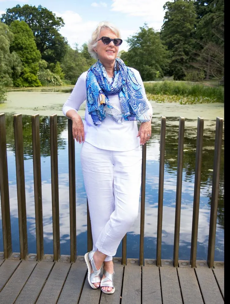 all white outfit with accent scarf summer fashion women over 60