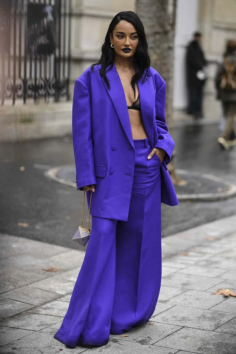 black lace lingerie bra oversized vibrant purple suit street style fashion week
