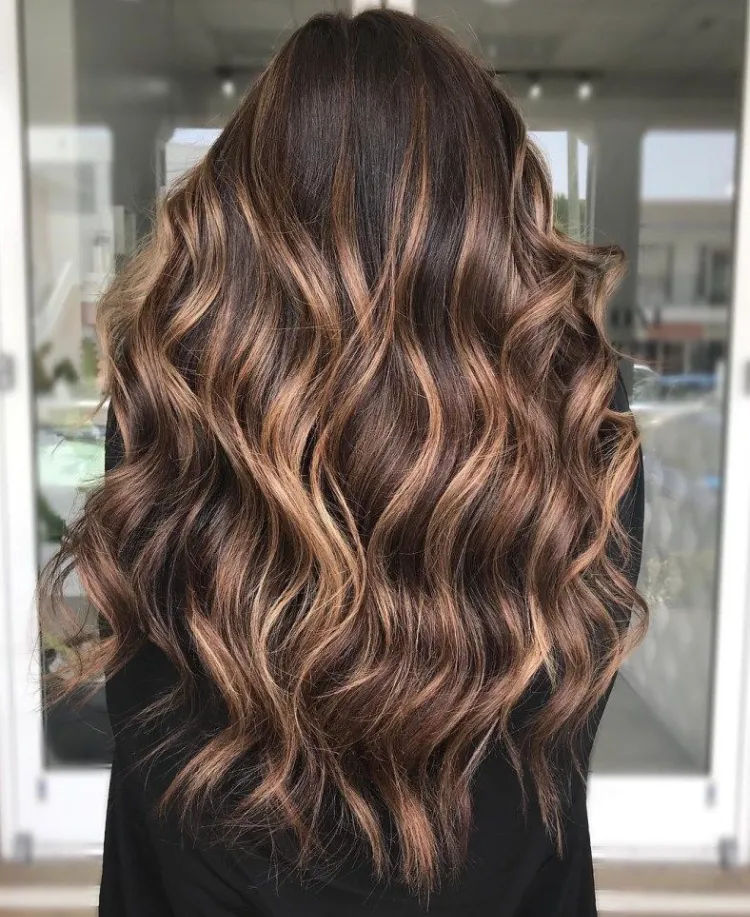 blonde highlights create a contrast your natural dark brown color is amazing just the way it is for a subtle difference in shade you could go for gorgeous flamboyage highlights