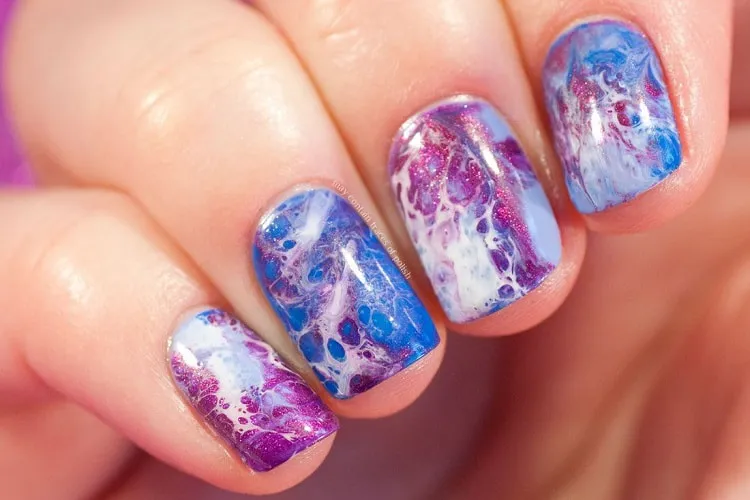 blue and purple abstract nail art