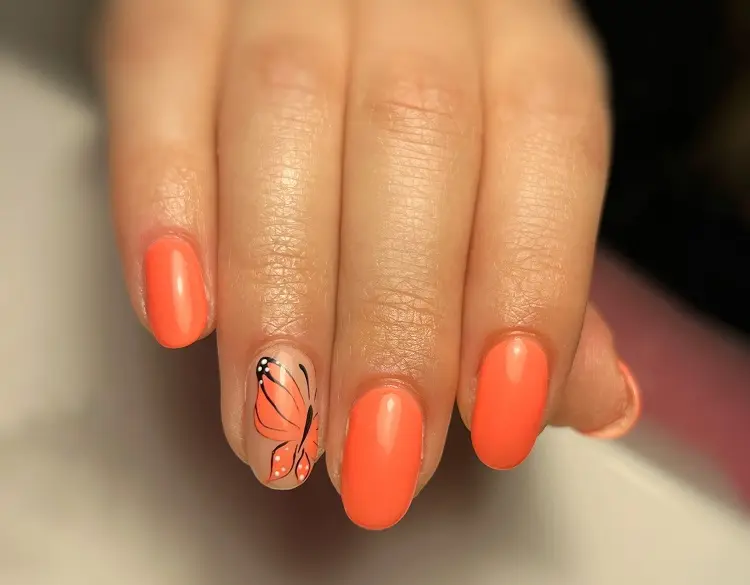 butterfly nails to try out in 2023 orange manicure design