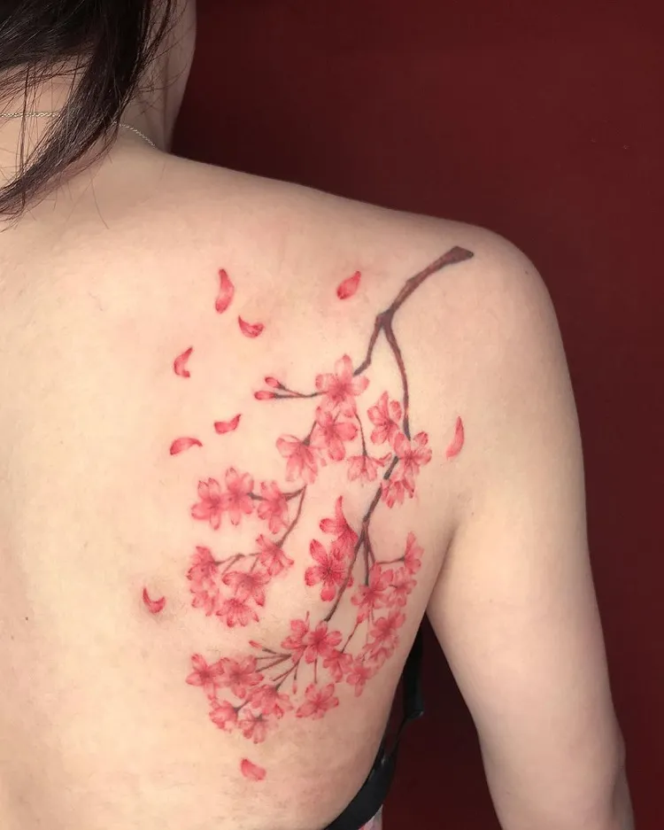 cherry blossom petals falling tattoo meaning back piece traditional japanese style
