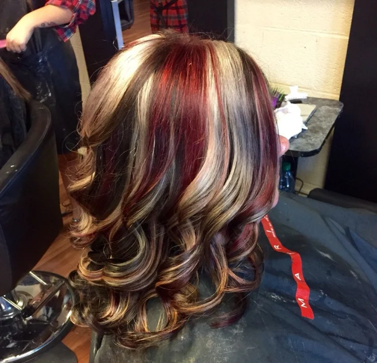 chunky red and blonde highlights in brown hair