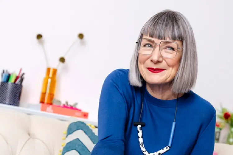 classic bangs for women over 50 with glasses gray haircut ideas