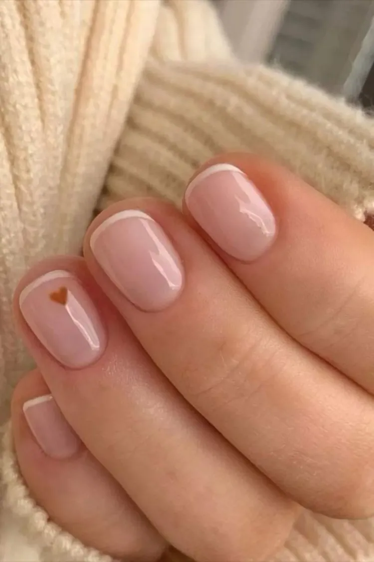 classic french manicure small brown heart minimalist nails ideas