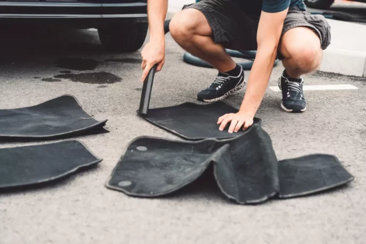 clean fabric car mats with a vacuum cleaner