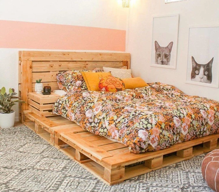 cute pallet bed idea warm colors