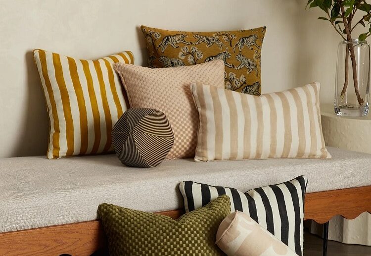 decorative asymmetrical outdoor throw pillows bold patterns stripes earthy colors decoration trends 2023