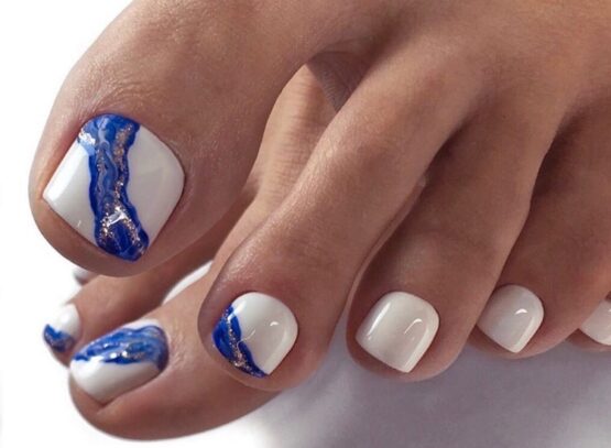 elephant bone nail polish with cobalt blue pedicure