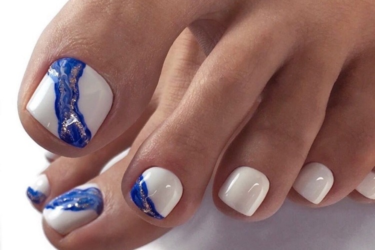 elephant bone nail polish with cobalt blue pedicure