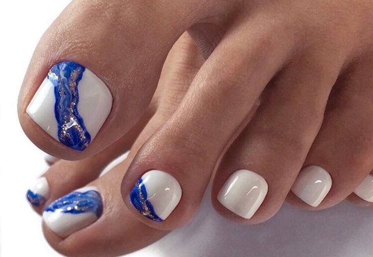elephant bone nail polish with cobalt blue pedicure