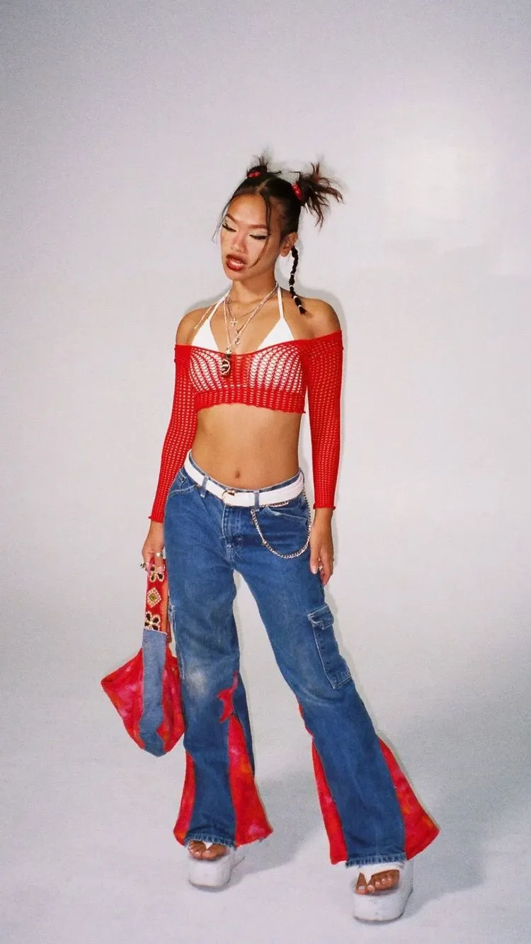 freaknik outfit flared low rise jeans cropped drop shoulder long sleeve top 90s y2k fashion