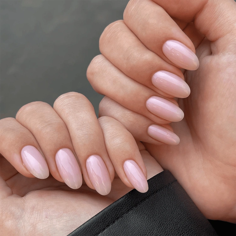 gorgeous strawberry milk manicure idea for medium length round nails