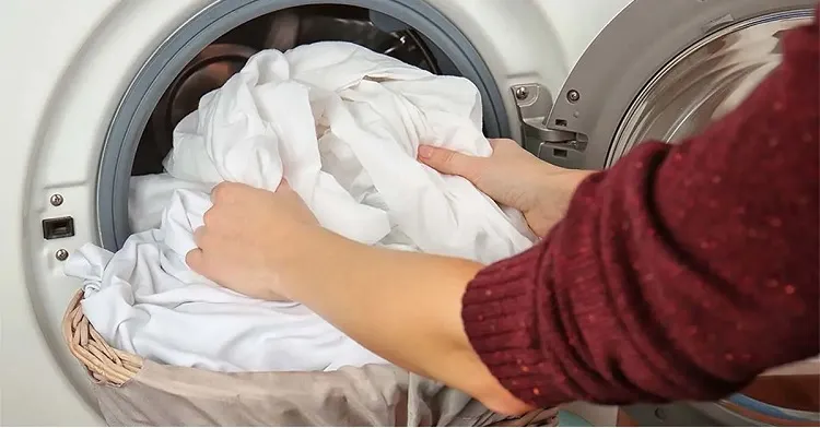 how to remove dust in your home put the sheets in the washing machine