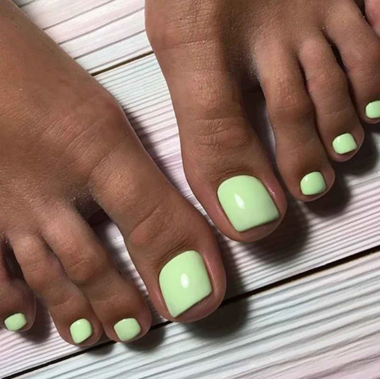 light green pedicure color for brown skin