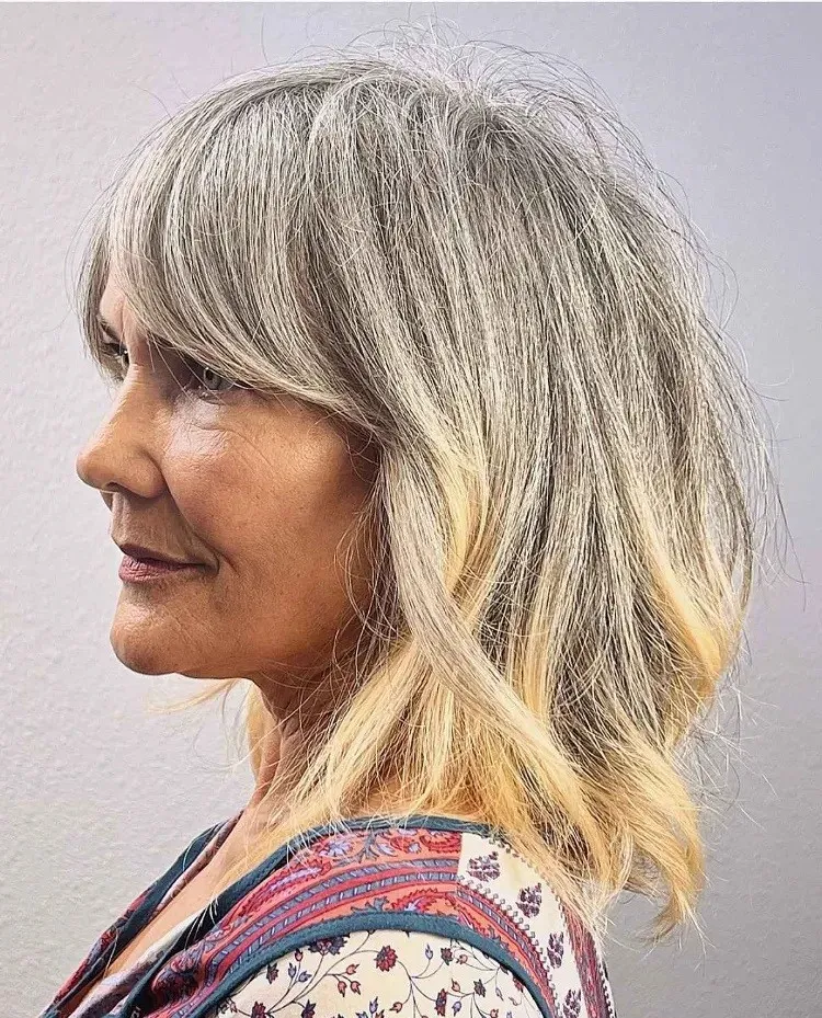 lob haircut with bangs over 50 hair trends 2023