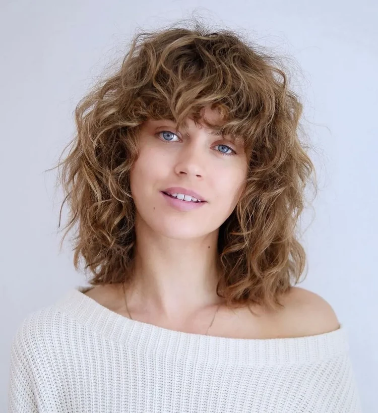 long curly bob with bangs for round face
