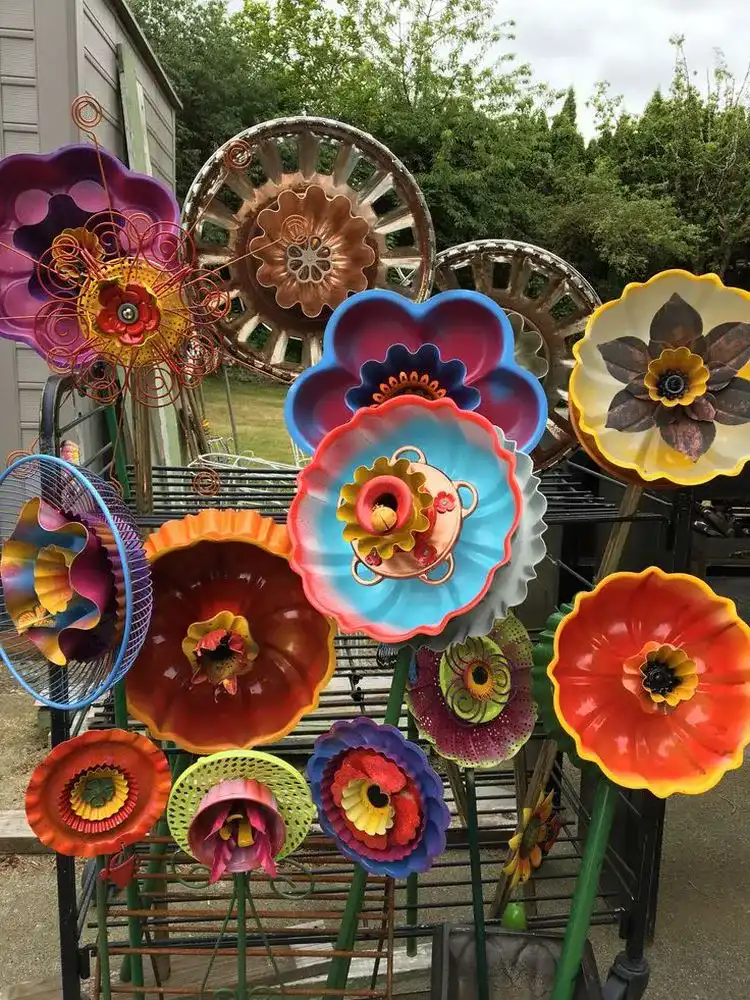 low budget yard art ideas bundt pans and kitchen utensils