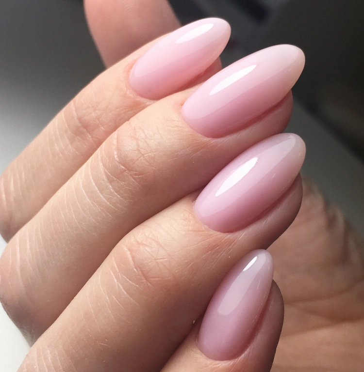 medium length oval nails strawberry milk color