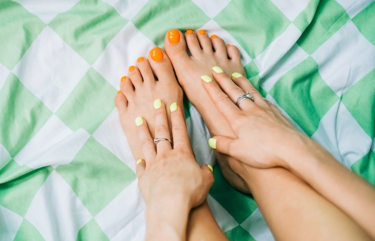 beautiful female feet with pedicure, copy space.