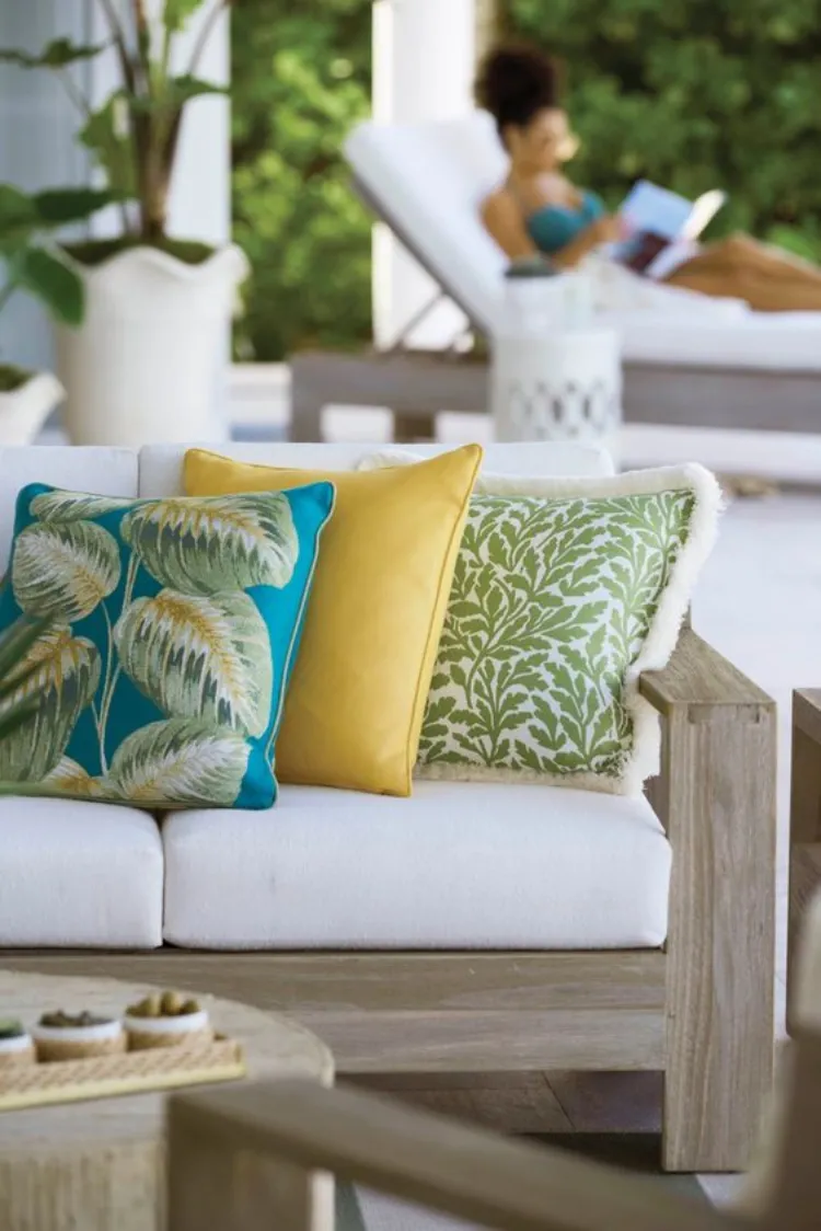 mismatched outdoor throw pillows resort tropical aesthetic summer decoration trends 2023