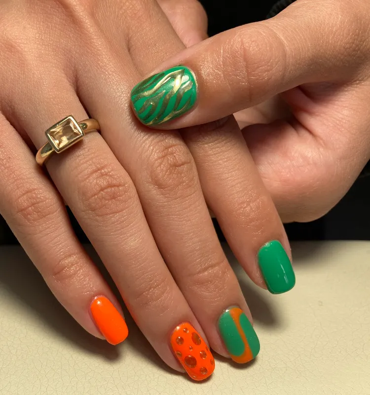 neon orange green gold animal print polka dots abstract summer manicure 2023