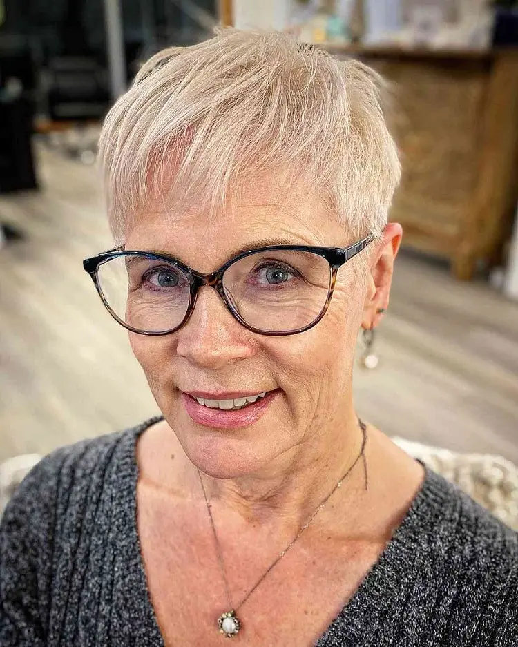 pixie haircut with glasses for women over 50 with wispy bangs