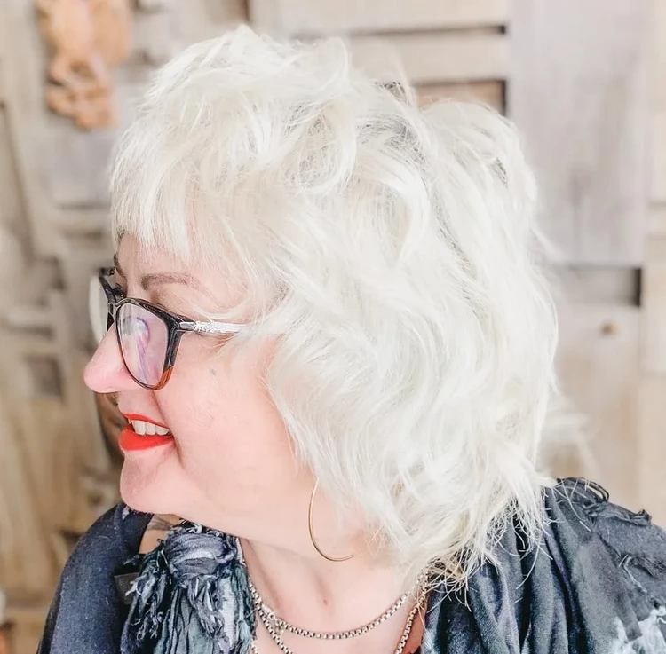 shaggy bob hairstyle for women over 60 with gray hair