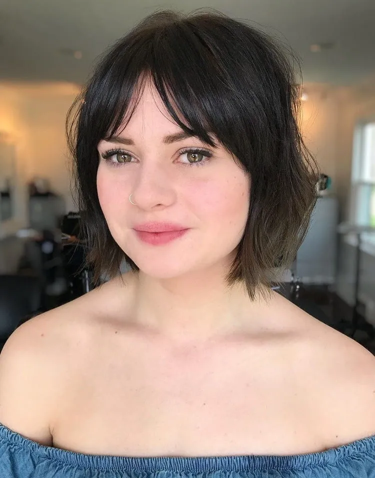 short bob haircut with curtain bangs for round face