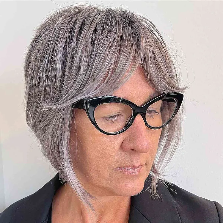 short bob with curtain bangs for women over 60 with gray hair