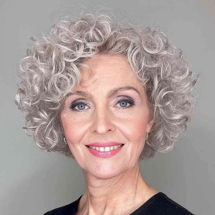 short curly hairstyle for older ladies layered bob with bangs