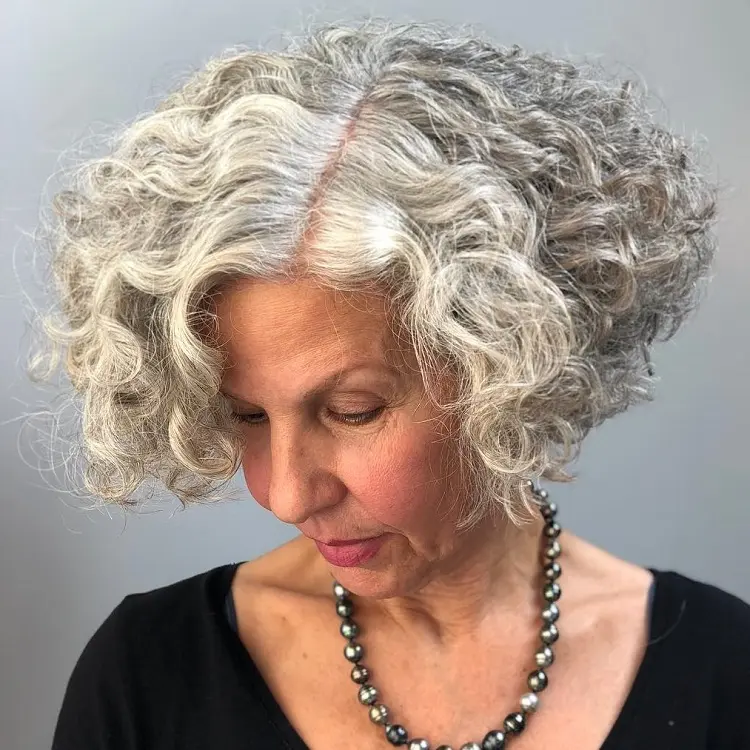 short curly hairstyles for women over 50 with round faces
