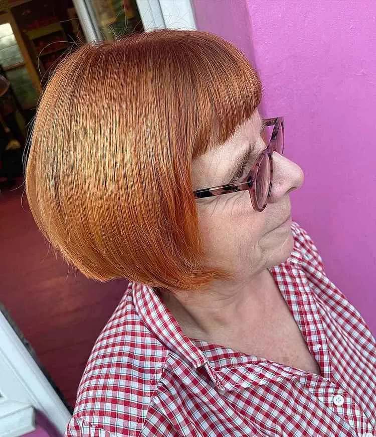 short layered bob with fringe for older women with straight hair