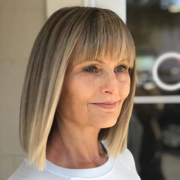 shoulder length hairstyle for women over 60 bob with bangs