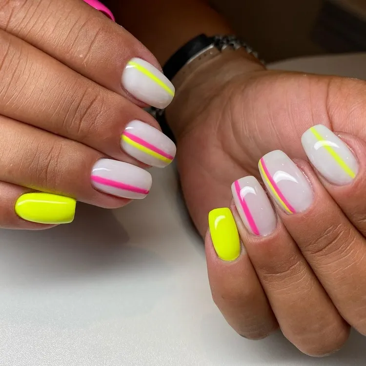 simple design yellow neon nail ideas pinstripes summer manicure trends