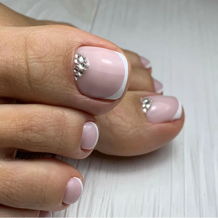 simple french pedicure with rhinestones