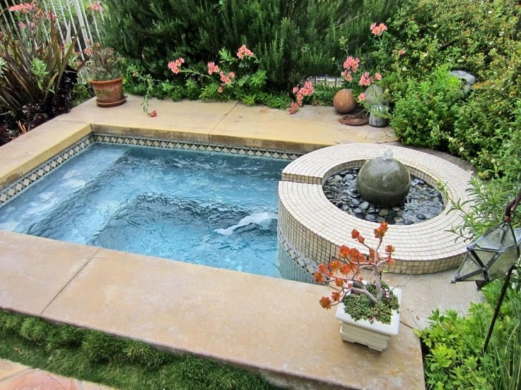 small backyard and a hot tub