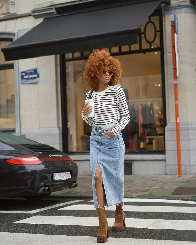 street style long maxi denim skirt petite women vertical stripe top chunky brown boots 90s fashion trend 2023