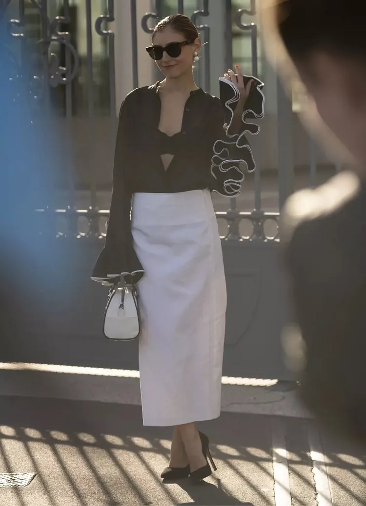 styling lingerie street style milan fashion week sheer black button up top flamingo sleeves ruffles white pencil skirt prada bag
