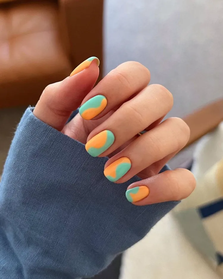 two tone swirl design orange mint green short nails color ideas summer 2023 manicure
