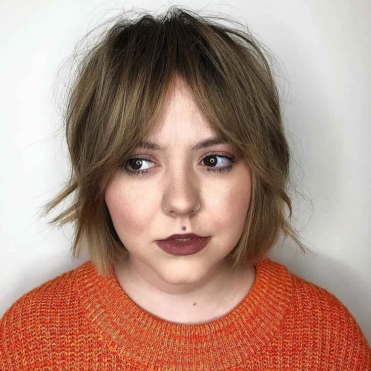 what hair cut is best for round face with bangs
